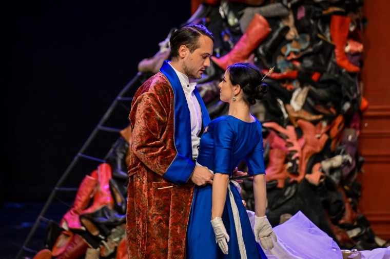 Luka Jozic in an embrace, wearing a patterned robe